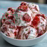 Homemade Strawberry & Banana Yoghurt Clusters with crisp freeze-dried fruit chips.