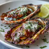 Lemon butter scallops seared golden and glistening in a bright citrus sauce, perfect for an elegant spring dinner.