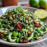 Shaved asparagus and pea salad with lemon dressing, fresh and vibrant, perfect for spring gatherings or light lunches.  
