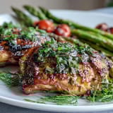 Healthy Easy Sheet Pan Chicken with Spring Veggies on a colorful tray, with juicy chicken and bright seasonal vegetables roasted to perfection.  