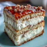 Delicious Gemini Cake recipe, showcasing beautiful marbled yellow and white frosting.